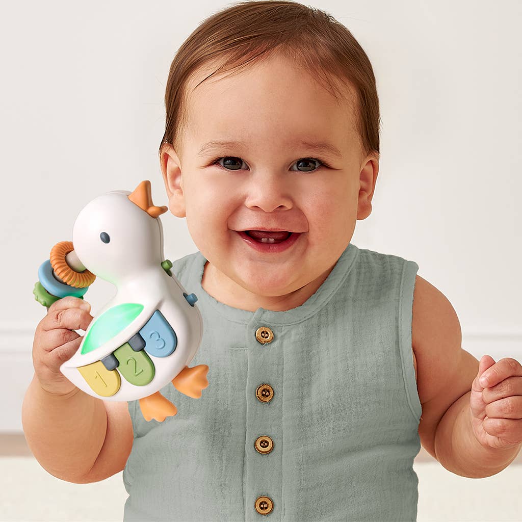 Itzy Ritzy Bitzy Tunes™ Goose - Light-up Interactive Piano Toy