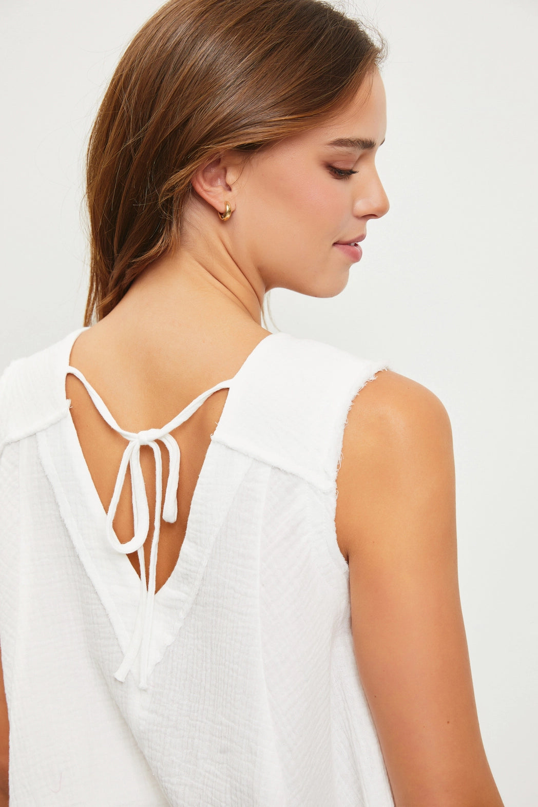 Take The Lead White Asymmetric Sleeveless Top